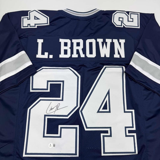 Framed Autographed/Signed Larry Brown 35x39 Dallas Blue Football Jersey Beckett BAS COA
