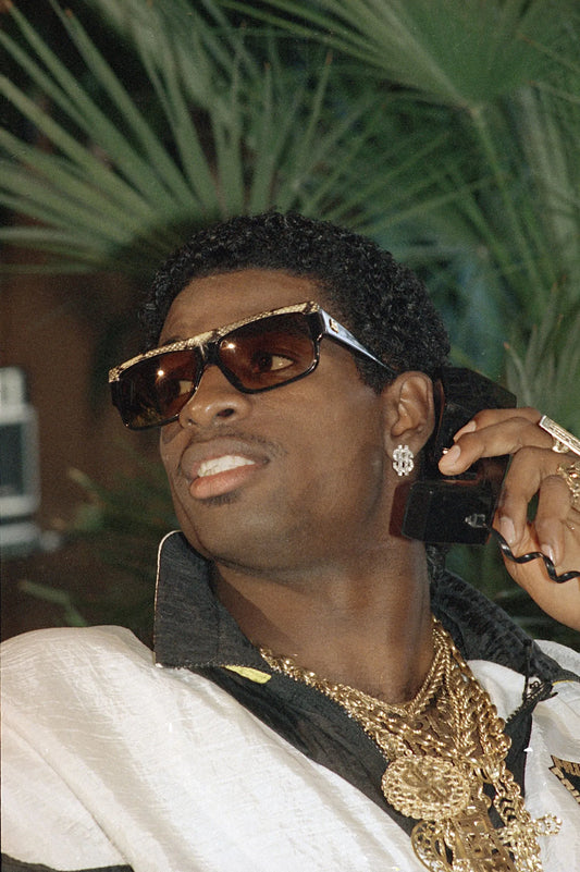 Deion Sanders: The 90s Phenomenon Who Redefined Sports and Style
