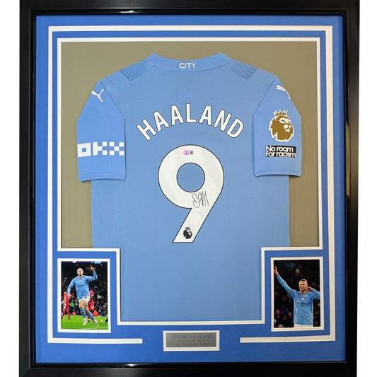 Framed Autographed/Signed Erling Haaland 35x39 Manchester City Blue Soccer Futbol Jersey Beckett BAS COA