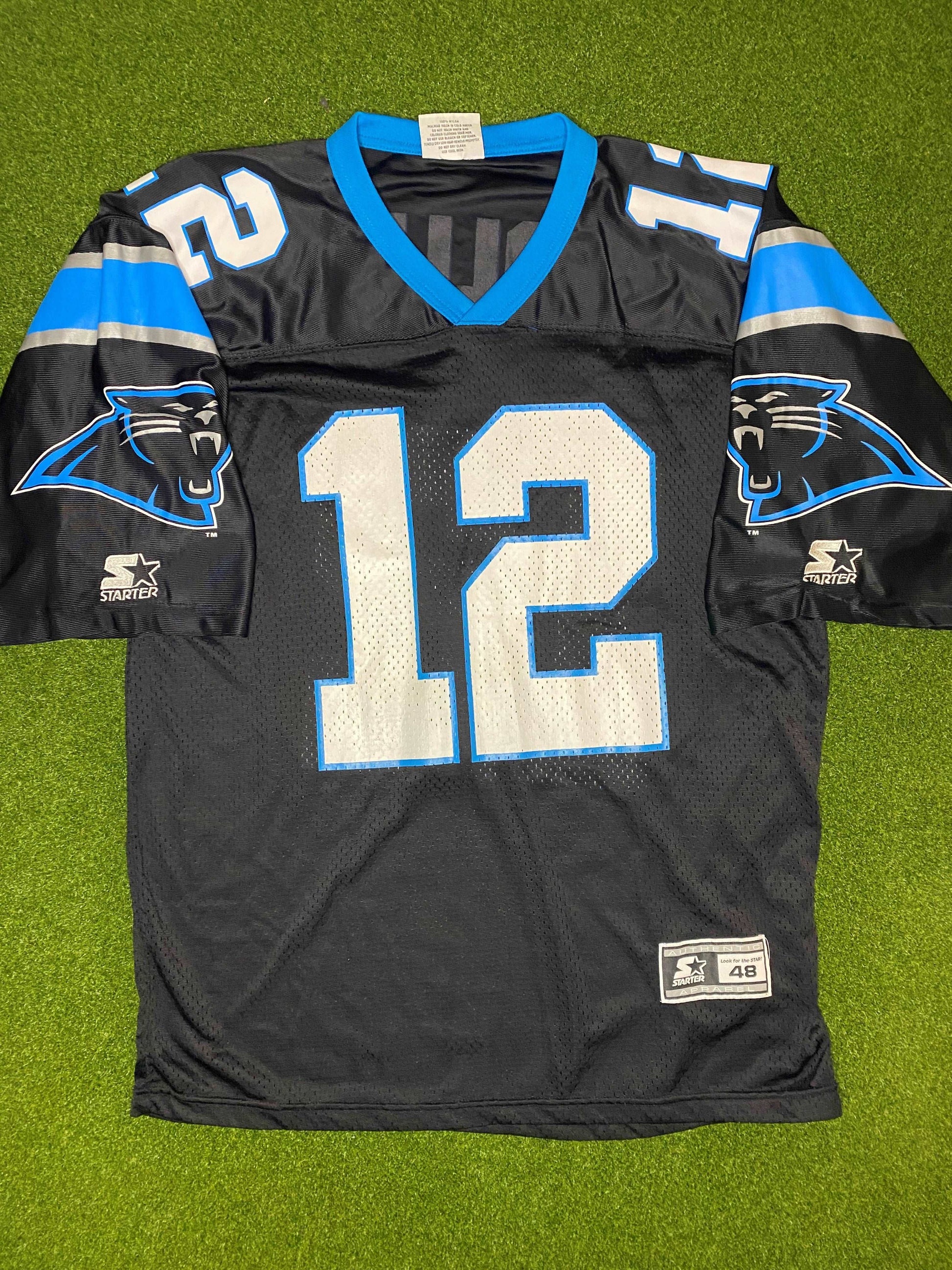 1995-1997 Carolina Panthers - Kerry Collins #12 - Vintage NFL Jersey (48) 1995-1997 Carolina Panthers - Kerry Collins #12 - Vintage NFL Jersey (48)